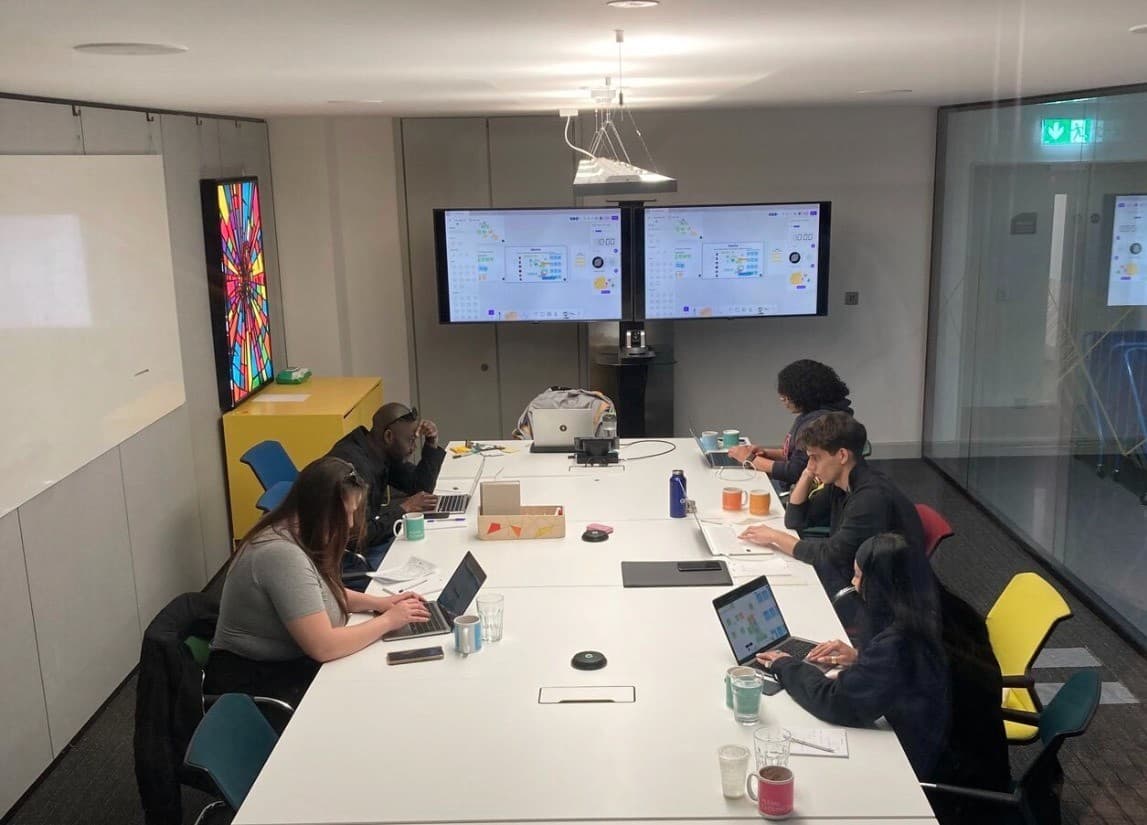 Jed running a design workshop with his team
